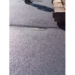 Protection for Asphalt-Coated Manhole Cover