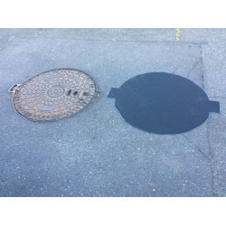 Protection for Asphalt-Coated Manhole Covers